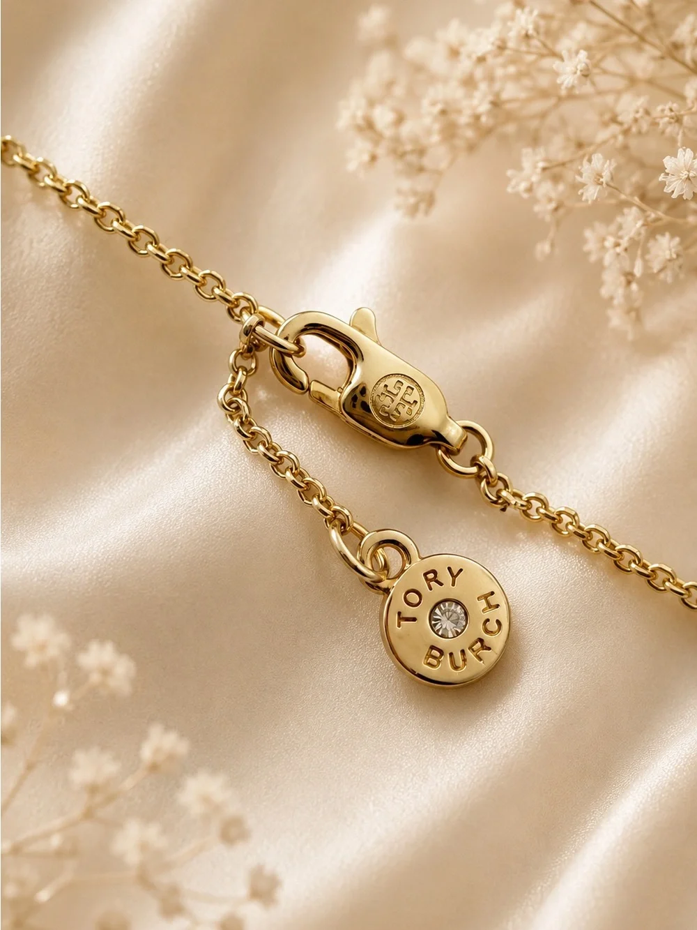 Tory Burch Gold and Black Logo Disc Bracelet